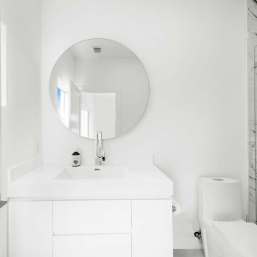 Refresh in style with sleek marble finishes and vibrant natural light!