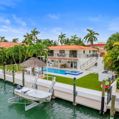 Waterfront escape with private dock, heated pool and plenty of space to live outside.