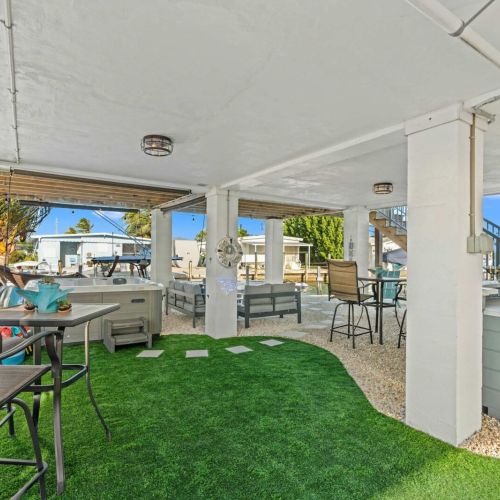 Discover the ultimate outdoor escape! This inviting space features a cozy lounging area, perfect for relaxation.