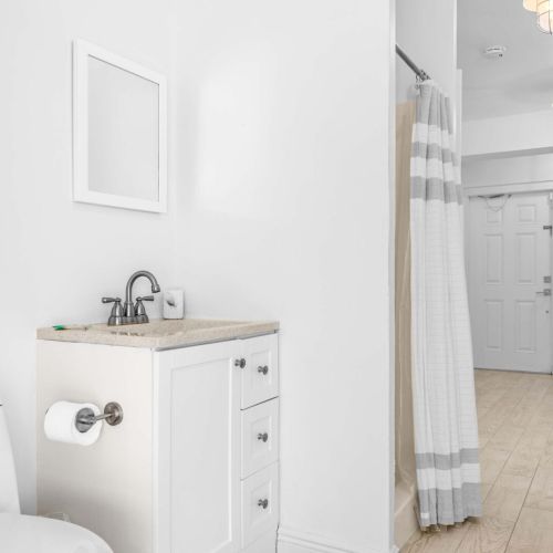 Simple and spotless. Convenient bathroom right off the pool area for quick rinse and go.