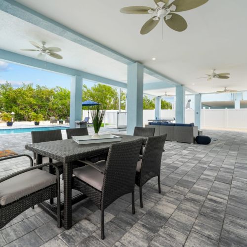 The ceiling fans will keep you cool while you unwind in the shade of the covered patio.