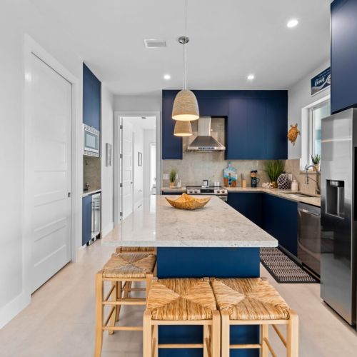 Watch the designated chef in action while enjoying a few drinks at the kitchen island.