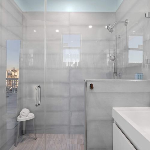 Step into a refreshing oasis with our stunning glass shower!