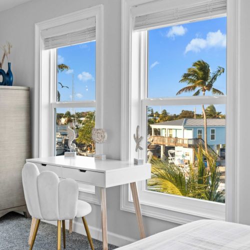 Delight in sunlit views and chic decor, perfect for relaxation in marathon's paradise!