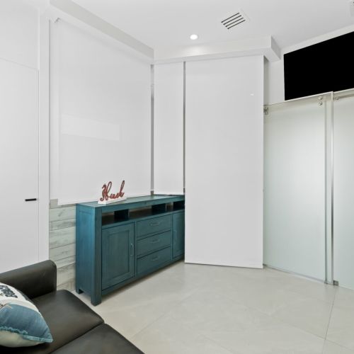 Electronic blinds can quickly turn the loft into another private quarter.