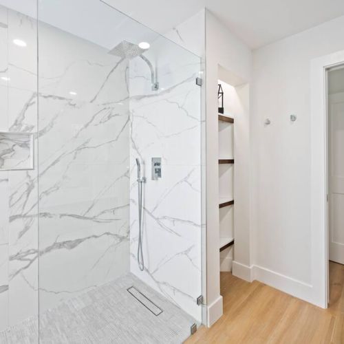 The inviting bathroom comes with a spacious walk-in shower.