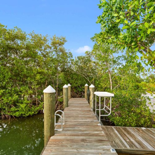 Hidden among the mangroves, your private dock feels like its own quiet escape into the keys’ wild side.
