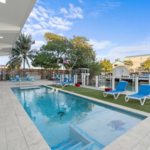 Picture yourself lounging by the crystal-clear pool, soaking up the sun and unwinding amidst beautiful surroundings