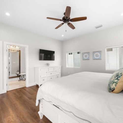 Primary suite: a king retreat with its own tv and a private ensuite just steps away.