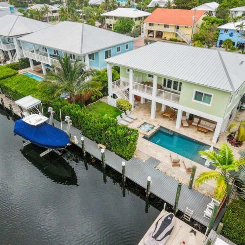 Private dock: tie up the boat and step straight into the backyard and pool.