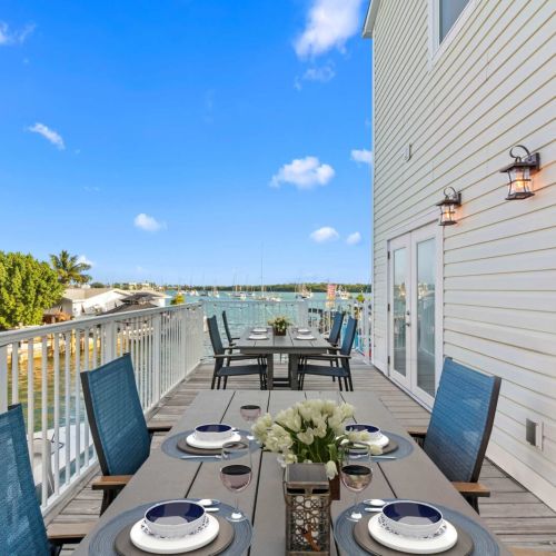 Savor sunset views over the water at this inviting al fresco dining space!