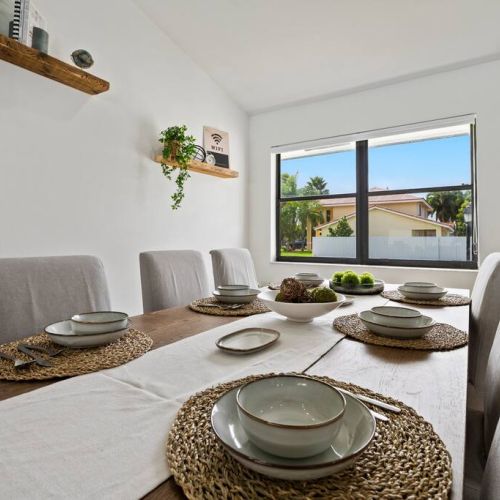 The dining room table can easily accommodate the whole group for a gourmet meal.