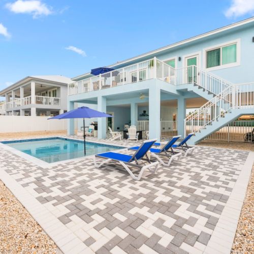 Welcome to the backyard! Marvel at the views from the deck or soak up the florida sunshine while lying by the swimming pool.