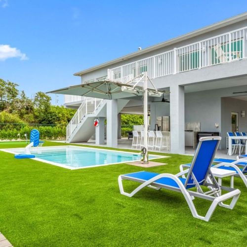 Kick back by the pool while drinks chill and boats cruise by in the canal.