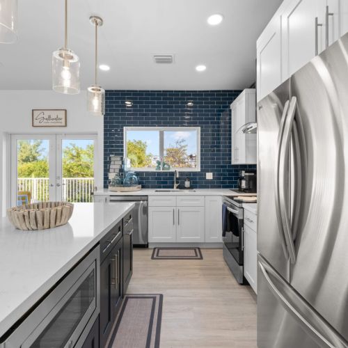 Experience the perfect blend of style and functionality in our contemporary kitchen.