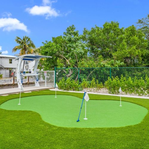 Private putting green in your backyard. Practice your short game between dips in the pool.
