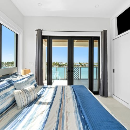 The sleek furnishings, clean lines, and ample natural light create a fresh and inviting ambiance, setting the stage for a restful night's sleep.