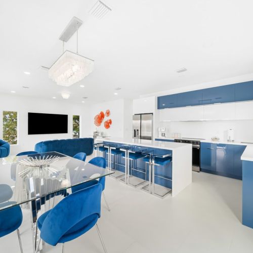 Vibrant blue accents and sleek design create a lively culinary haven!