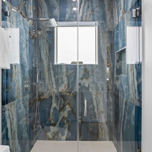 Enjoy spa-like relaxation in the beautifully appointed ensuite bathroom.