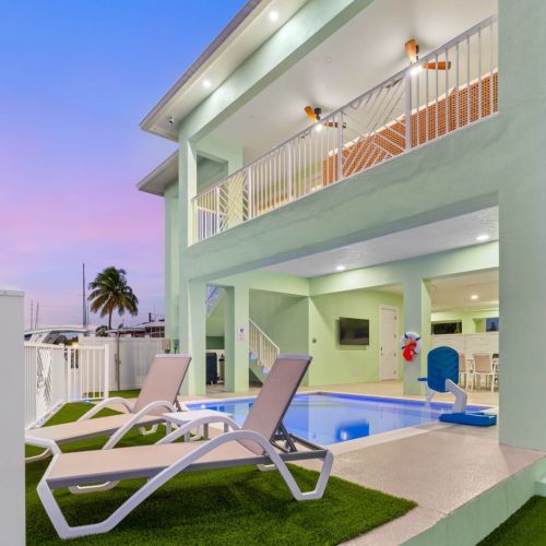 Sunset pool hangout with canal views. Lounge on the deck, grill downstairs, or watch the boats go by from the balcony. Perfect spot to wind down after a day on the water.