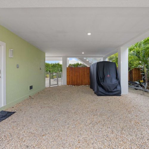 Covered carport: plenty of shaded space to park and stash the trailer and gear.