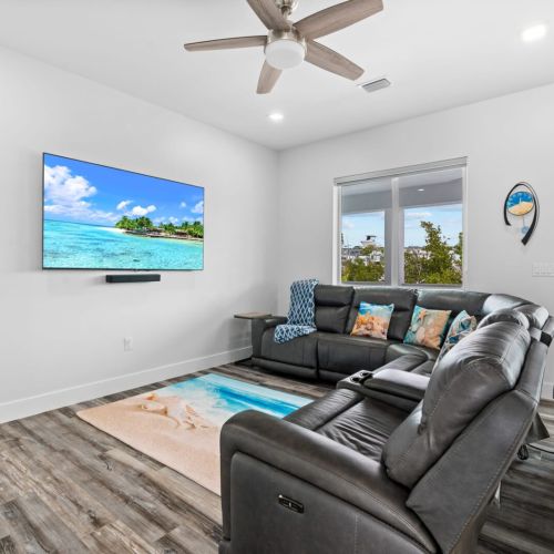 Everyone can comfortably sit on the oversized sectional while waiting for the movie to start.