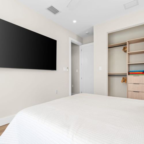 Large smart tv and built-in closet make this room perfect for unwinding after a day on the water.