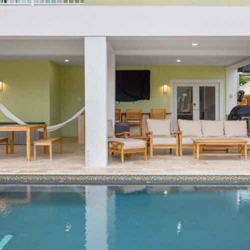 Patio & pool: lounge in the shade or stretch out by the water with the grill close by.