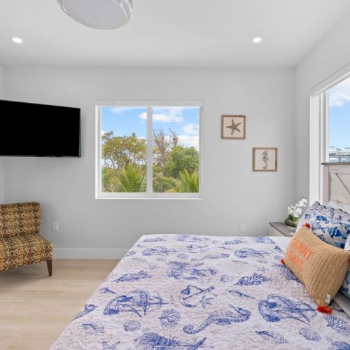 Dreaming of lazy sundays in a bedroom furnished with a luxurious bed and a state-of-the-art flat screen tv. Create your perfect retreat today!