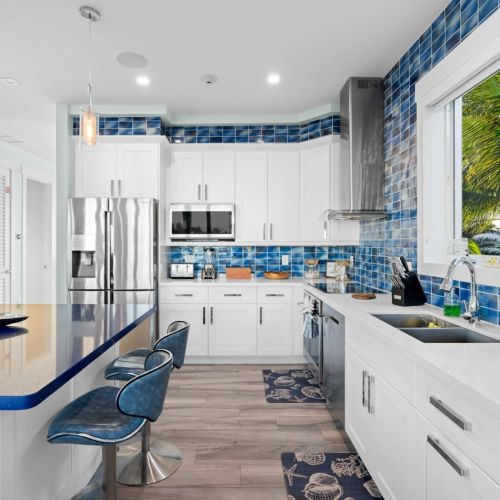 With spacious countertops and sleek cabinetry, it's a delightful space to whip up your favorite meals. Come create unforgettable memories here!
