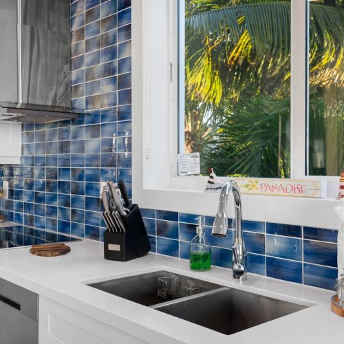 Welcome to your cozy kitchen getaway! Whip up your favorite brew at the coffee bar, where the white cabinets shine and every cup is a new adventure.