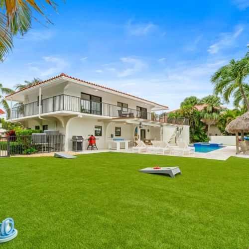 Spacious backyard for games, chilling and hanging out between dips in the pool.