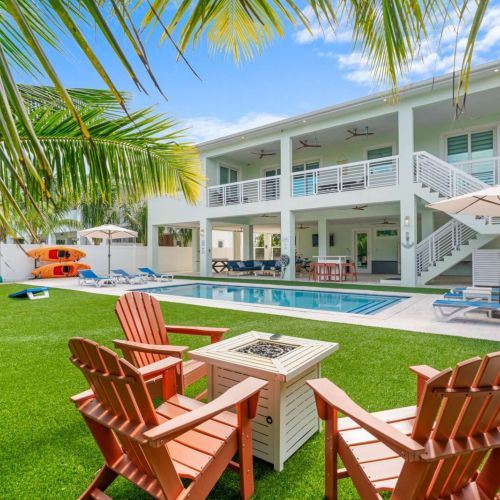 Backyard serenity meets tropical style. Lounge under the palms, grill by the pool, or unwind by the firepit as the sun sets over your private emerald oasis. Every detail invites relaxation and effortless island living.