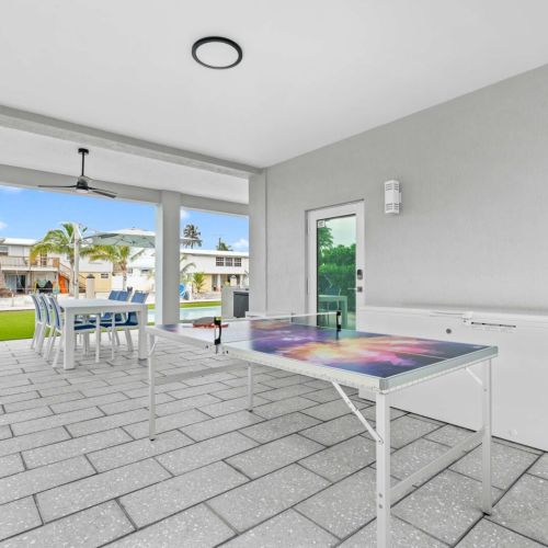 Ping-pong tournaments by the pool — loser has to jump in.