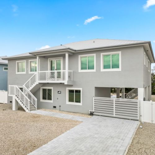 We've got enough parking space for four cars and a trailer.