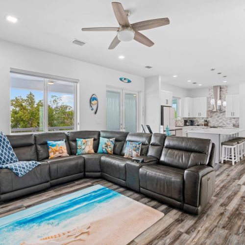 This modern and stylish living area is the perfect place to relax and unwind after exploring.