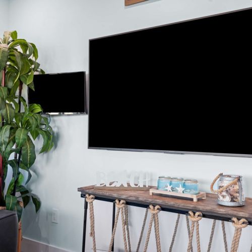 With comfy couches and a big screen tv, you'll feel right at home in this stylish space. Get ready to create lasting memories together!