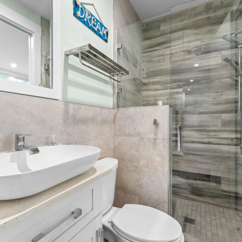 Another cozy bathroom with stylish custom tiles.