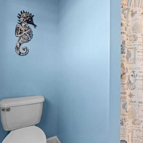 Dive into relaxation with nautical decor and ocean-inspired hues!