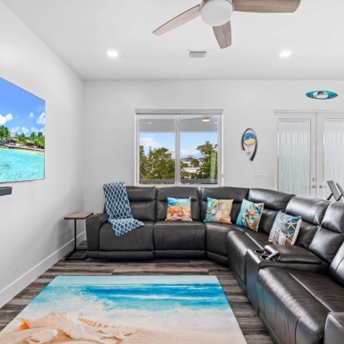 Everyone can comfortably sit on the oversized sectional while waiting for the movie to start.