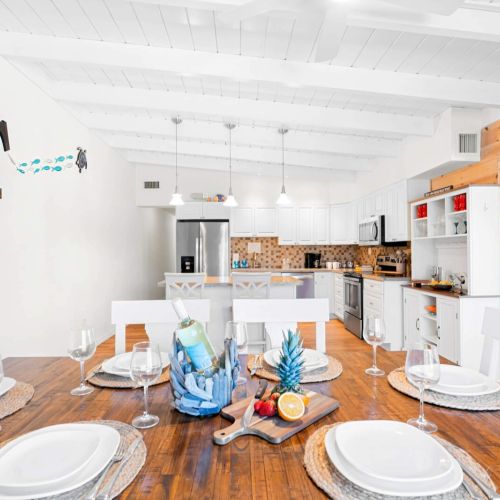 Gather around the beautifully set dining table where delicious meals and unforgettable memories await! Our inviting space is perfect for sharing laughter, stories, and great food with loved ones.