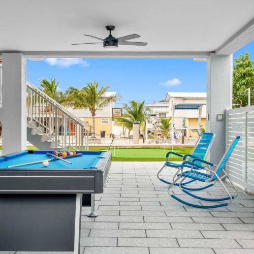 Cue up a game and let the canal breeze do the rest. This space is vacation without effort.