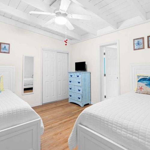 Welcome to your cozy retreat! With two comfy beds waiting just for you, this bedroom is perfect for friends or family. Relax, unwind, and make memories in style!