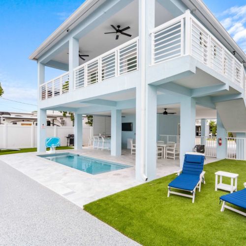 Afternoons by the pool feel easy here. Float, tan, or cool off under the patio while the palms sway in the breeze. Everything about this space invites you to slow down and stay awhile.