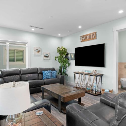 Kick back in our spacious living room, perfect for family movie nights or simply lounging around. Enjoy the comfort of plush couches and a big screen tv, making it the ultimate spot to unwind after a day of adventures.
