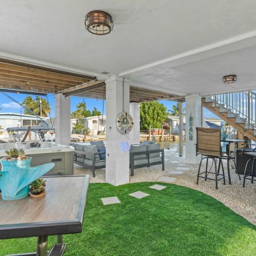 Unwind in style with a private hot tub and stunning waterfront views!