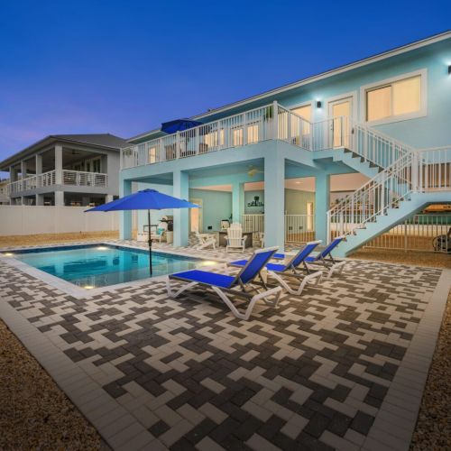 Welcome to the backyard! Marvel at the views from the deck or soak up the florida sunshine while lying by the swimming pool.