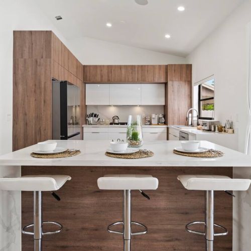 Have a few drinks at the kitchen bar while watching the designated chef in action.