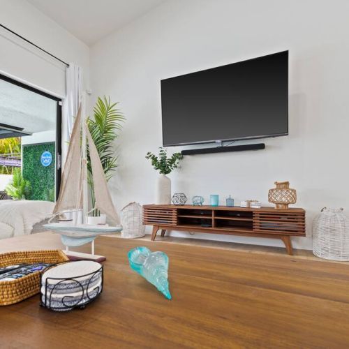 Lovely coffee table will hold your snack and drinks during the entertaining movie night.