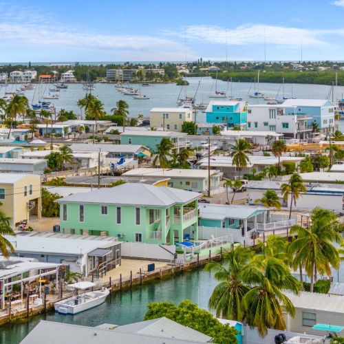 Discover life on the water in this peaceful marathon canal community, where palm trees sway and your private dock awaits every morning's adventure.